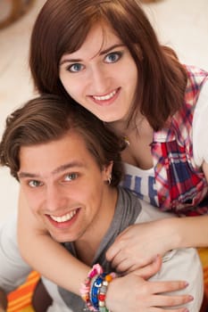 Young beautiful caucasian couple at home