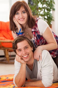 Young beautiful caucasian couple at home