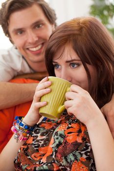 Young beautiful caucasian couple at home