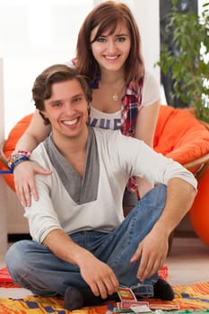 Young beautiful caucasian couple at home