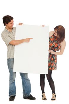 Caucasian couple with blank papers in their hands over white background