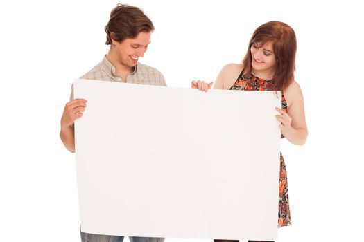 Caucasian couple with blank papers in their hands over white background