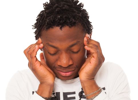 Handsome black guy have a headache isolated over white background