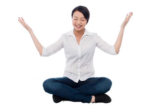 Pretty girl enjoying meditation process