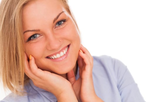 Closeup portrait of young blond caucasian woman smiling over white background