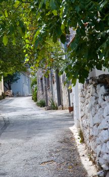 Street of the old Greek village. Crit .