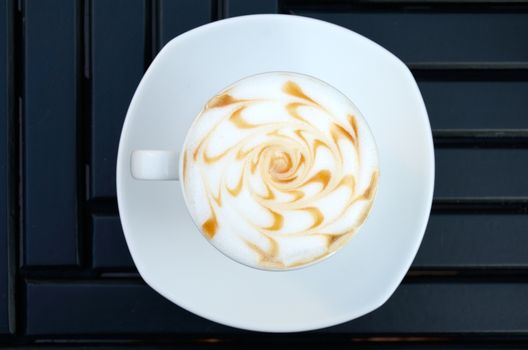Hot coffee on table in cafe