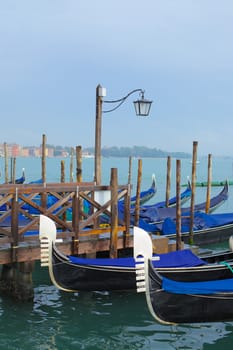 Gondolas on Grand Canal in Venice. Italy. Vertical view