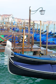 Gondolas on Grand Canal in Venice. Italy. Vertical view