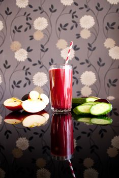 healthy juice made of variety fresh organic fruits and vegetables