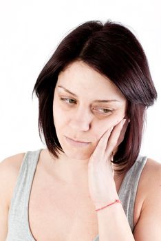 young woman with tooth ache making massage to avoid pain