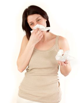 sneezing woman holding tissues, allergy or cold flu concept