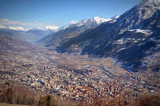 High view of Aosta city and its valley in the Alps, northern Italy