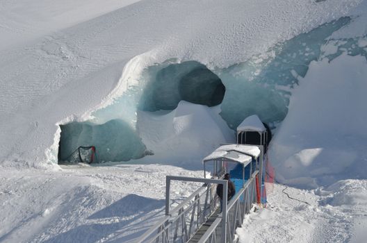 Entrance to ice cave under Mer de Glace glacier in Chamonix, french Alps