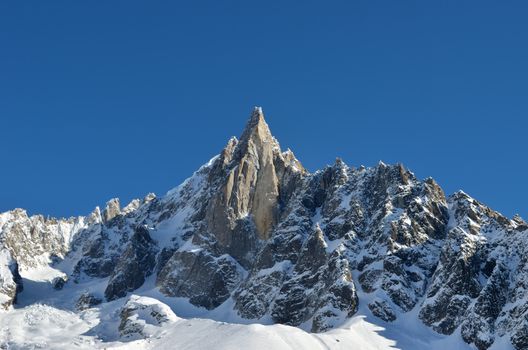 Chamonix, France: the Aiguilles mountain range peaks and blue sky