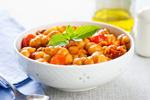 Pasta with tomato sauce and basil