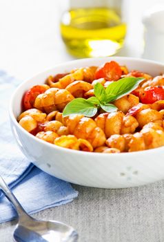 Pasta with tomato sauce and basil