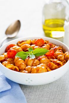 Pasta with tomato sauce and basil