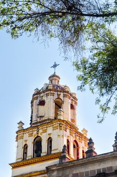 Spire of a church in Coyoacan neighborhood of Mexico City