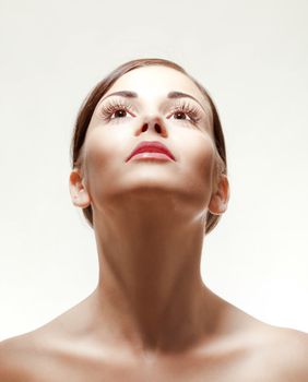 portrait of a young beautiful woman with brown hair looking