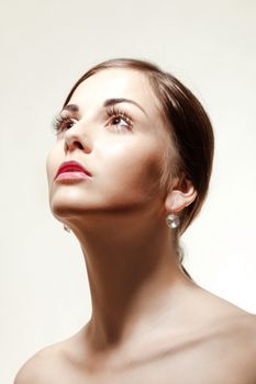 portrait of a young beautiful woman with brown hair looking