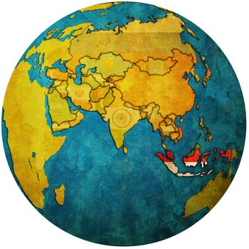 isolated over white territory of indonesia with flag on globe map