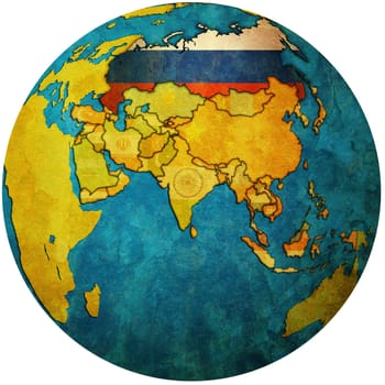 isolated over white territory of russia with flag on globe map