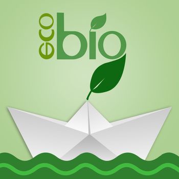 eco bio paper boat in the green