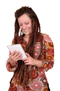 happy girl with dreadlocks hair play tablet pc