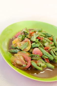 spicy cowpea salad on green dish , asian cuisine .