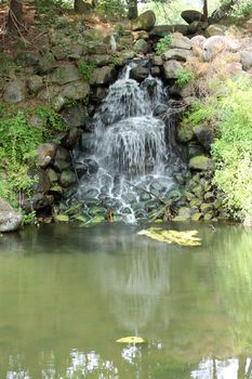 A waterfall on a pond