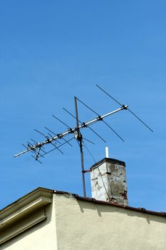 TV antenna on the roof of a building