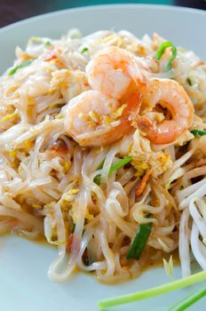 Stir fried  noodles with shrimp , egg  and fresh vegetable , asian style food 