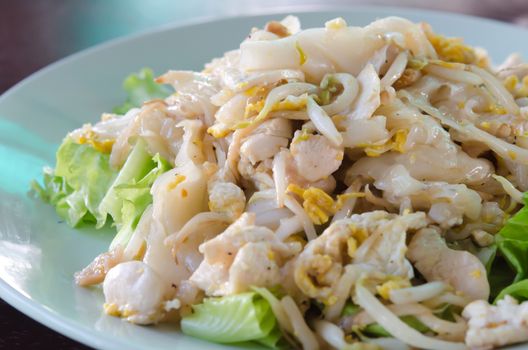 Fried Noodles with Chicken and vegetable on dish