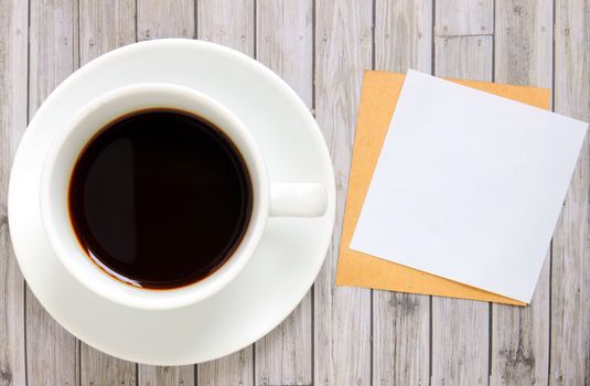 Blank paper with hot coffee cup