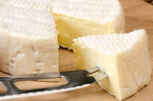 French cheese on a wooden board.