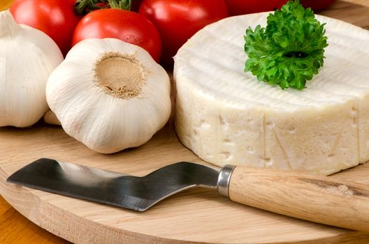 French cheese on a wooden board.