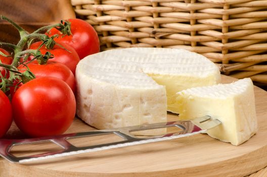 French cheese on a wooden board.