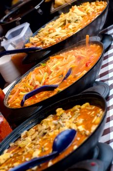 cooking food in the central market of Helsinki. Finland.