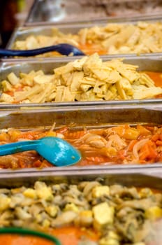 cooking food in the central market of Helsinki. Finland.