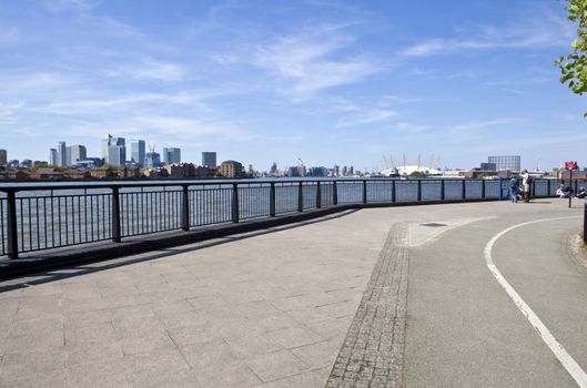 Thames Path leading past the sights of Docklands and the Millennium Dome in London.