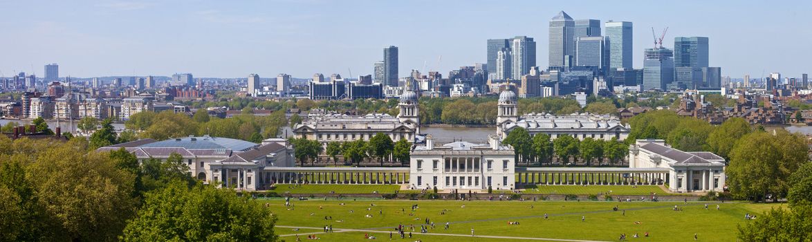 A beautiful panoramic shot taken from the Greenwich Observatory in London.  The view takes in sights such as Docklands, the Royal Naval College, the Queen's House and the River Thames.