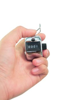 hand clicks a tally counter to number one in isolated background