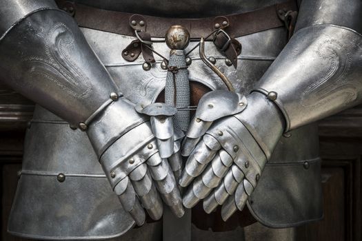 Detail of a knight armor with sword