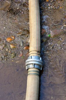 wasting water in the garden - broken large hose