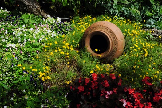 Flower garden with a jar inside 