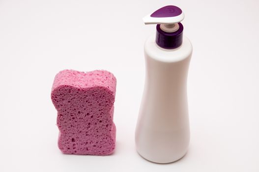 soap and purple sponge for the bathroom