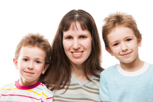 Smiling mother and little sons - family happiness