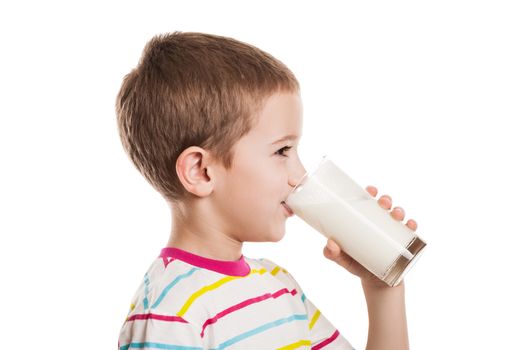 Beauty smiling child boy hand holding milk drink glass white isolated