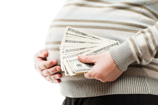 Pregnancy and surrogacy concept - pregnant woman hand holding dollar currency cash